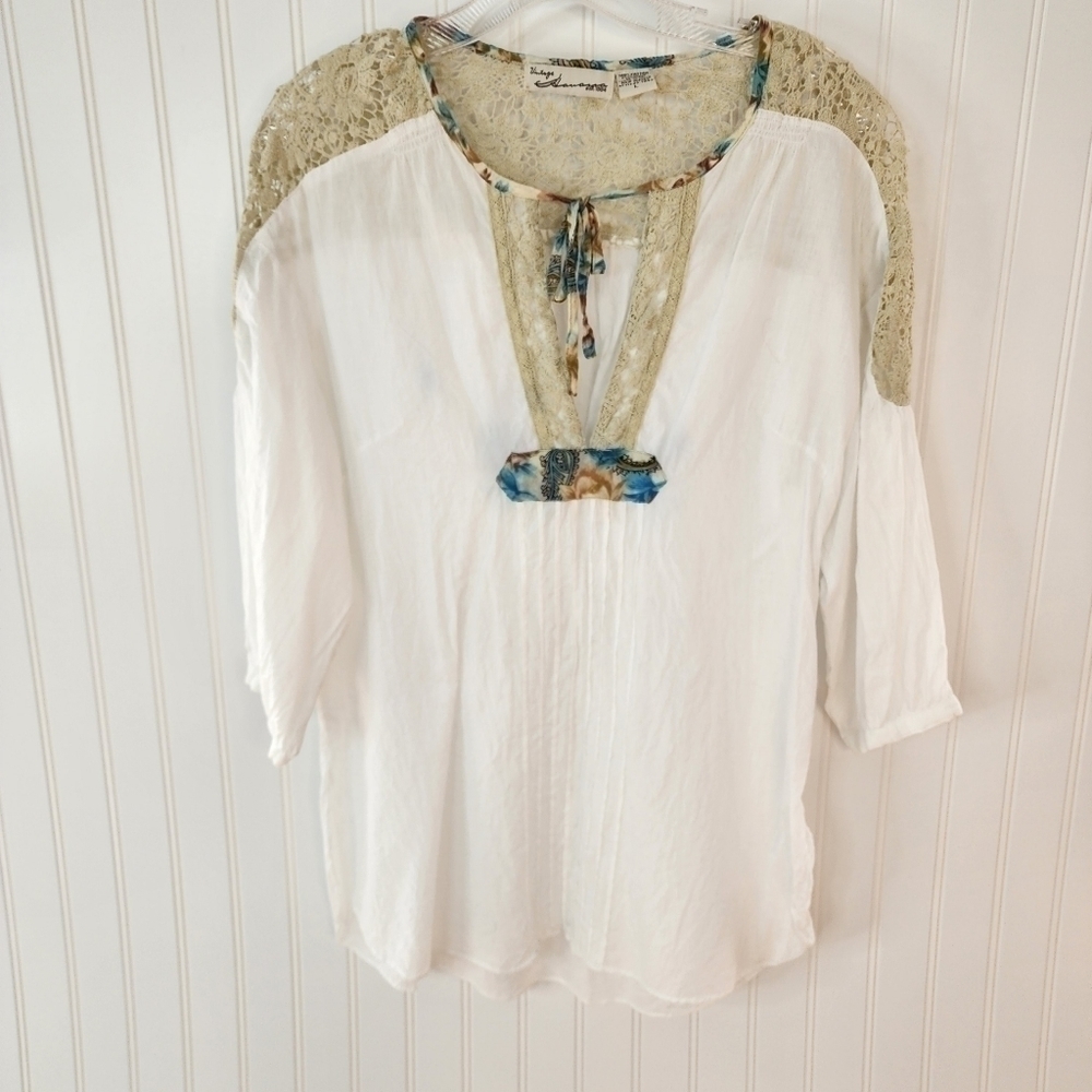 Vintage Havana cream light weight blouse w/ lace and flower pattern around neck.